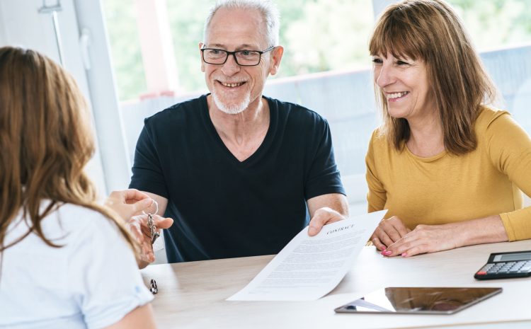 Senior couple meeting real estate agent